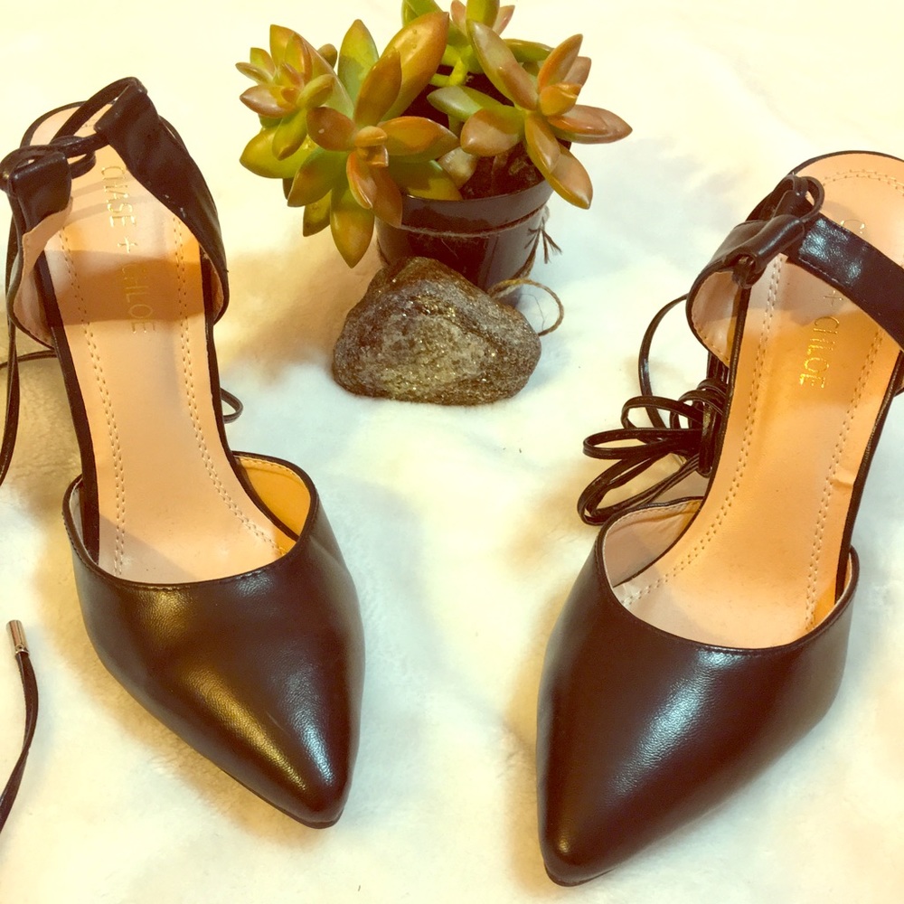 All black lace up stiletto heels by Chase + Chloe